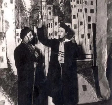 [Two actors in the play "The Journeys of Benjamin the Third"]